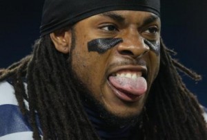 richard sherman seattle seahawks biting tongue