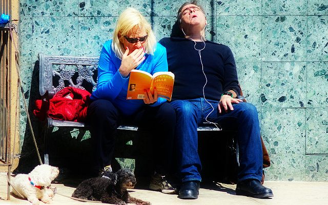 couple reading book books tolle sleeping